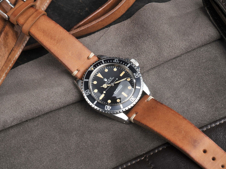 https://magazine.bulangandsons.com/wp-content/uploads/2014/09/BS-W-50-Rolex-5513-Orange-PTag-914-22.jpg