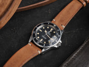 https://magazine.bulangandsons.com/wp-content/uploads/2014/09/BS-W-50-Rolex-5513-Orange-PTag-914-22.jpg