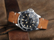 https://magazine.bulangandsons.com/wp-content/uploads/2014/09/BS-W-50-Rolex-5513-Orange-PTag-914-22.jpg