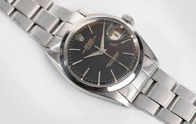 Rolex Date Black Gilt Tropical Dial Reference 1500