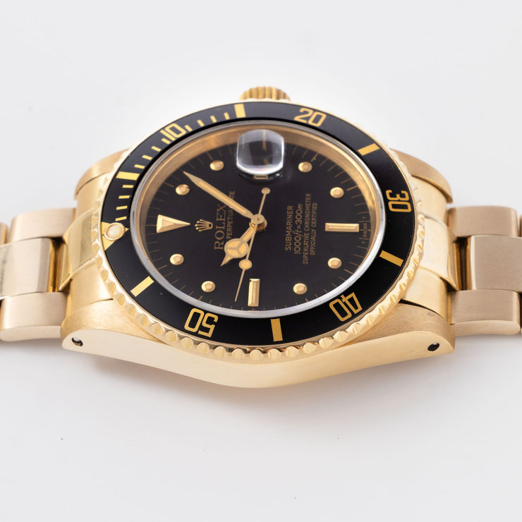 Rolex Submariner Date in 18k  gold ref. 16808 with black nipple dial Box and Papers