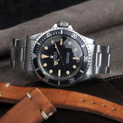 https://magazine.bulangandsons.com/wp-content/uploads/2014/09/BS-W-50-Rolex-5513-Orange-PTag-914-22.jpg