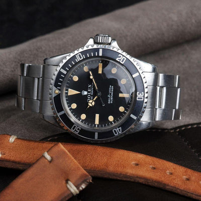 https://magazine.bulangandsons.com/wp-content/uploads/2014/09/BS-W-50-Rolex-5513-Orange-PTag-914-22.jpg